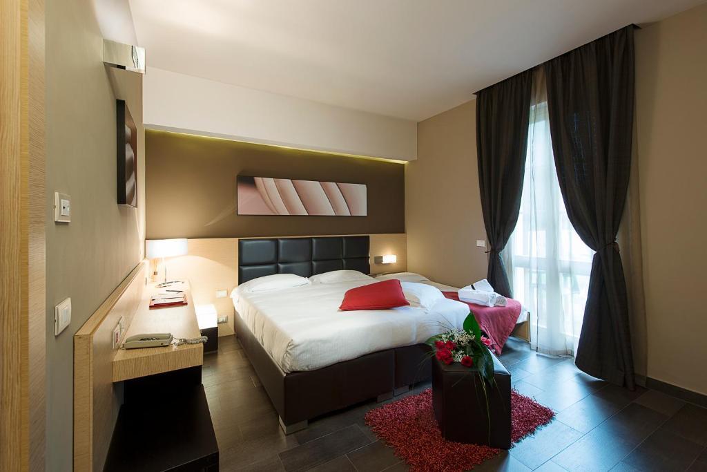 Unahotels Villa Dei Platani Фолиньо Номер фото