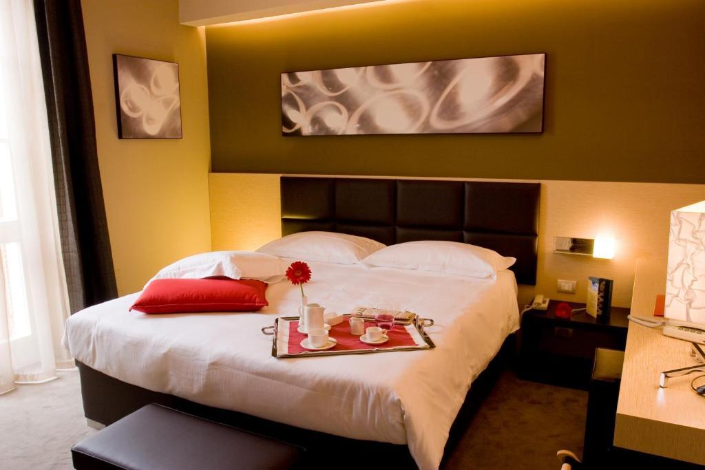 Unahotels Villa Dei Platani Фолиньо Номер фото